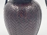 an image of a vase with a handle on a white background
