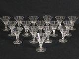 a group of wine glasses sitting on top of a black table