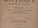 an old book with a black and white title on it