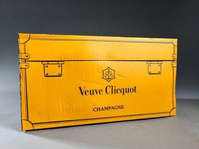 a yellow box of champagne sitting on top of a table