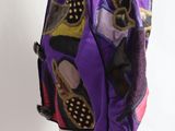 a picture of a mannequin with a purple jacket on it