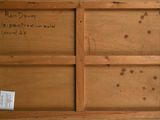 a picture of an old wooden box with writing on it