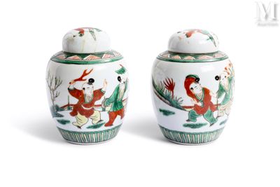 two vases with birds on them on a white surface