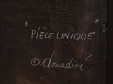 a black book with writing on it that says piee unique