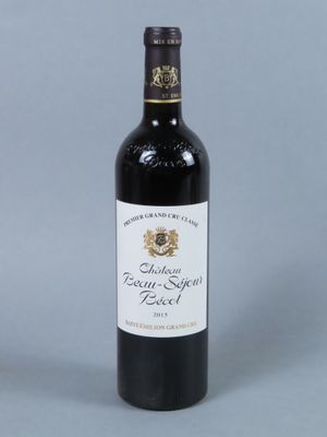 a bottle of wine that is sitting on a table