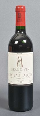 a bottle of wine that is sitting on a table