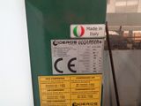 a machine that has a sign on it that says made in italy