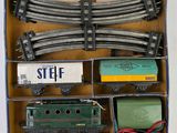 a box with a train set inside of it