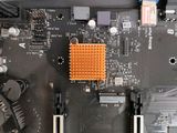 a close up of a computer motherboard with a cpu on it