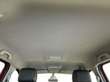 a view of the inside of a car from the passenger seat