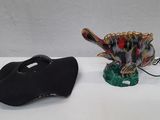 two items that are sitting on a white table
