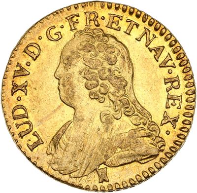 une pièce d'or ornée d'une tête de femme