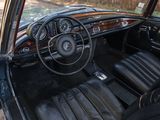 a black car with leather seats and a steering wheel