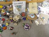 a pile of pins and other items on the floor