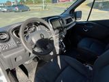 a view of the inside of a car from the driver ' s seat