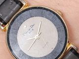 a close up of a wrist watch on a person ' s arm