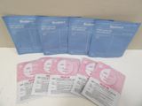 five packets of bioderm face masks sitting on top of a table