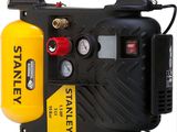 a black and yellow air compressor on a white background
