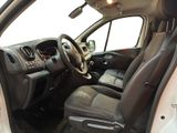 a view of the inside of a car from the driver ' s seat