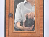 a man taking a picture of himself in a mirror