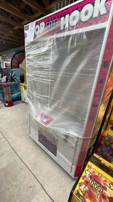 a large display of toys and games in a store