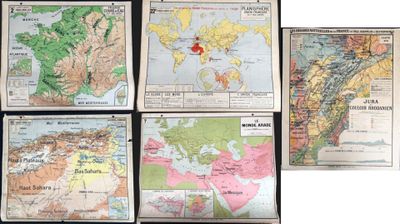 several maps of the world are displayed on a black surface