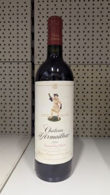 a bottle of wine that is sitting on a counter