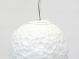 a white light that is hanging from the ceiling