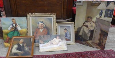 many pictures of people sitting on a table next to a bed