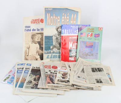 several newspapers are stacked on top of each other on a white surface