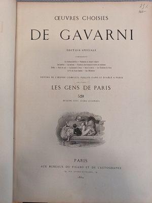 a book with a picture of a man and a woman sitting on a couch