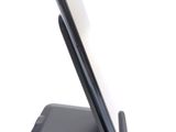a cell phone that is sitting on top of a stand