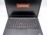 the lenovo laptop is open and ready to be used