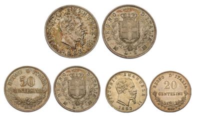a set of five different coins with the names of different countries on them