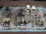 a tray that has a bunch of toy cars in it