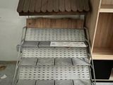 a shelf that has some shelves on it in a room