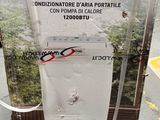 packaging of a water heater sitting on top of a wooden pallet