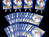 six packs of pokemon trading cards on a black background
