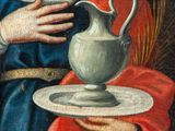painting of a woman holding a plate with a pitcher on it