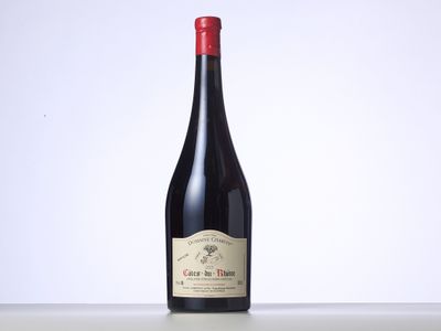 a bottle of wine that is sitting on a table