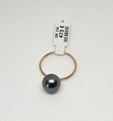 PORCHET- Une bague en or rose 750/1000 sertie d'une perle de…