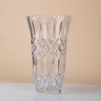 a glass vase that is sitting on a table