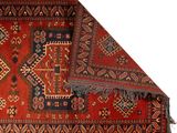 an image of a red and blue area rug on a white background