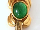 an image of a close up of a bracelet with a green and blue stone