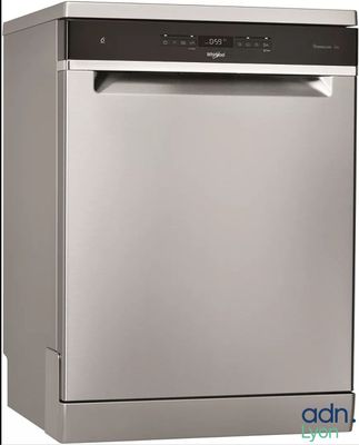 a stainless steel dishwasher sitting on top of a white counter