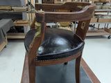 a chair that is sitting in the middle of a room