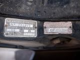 a close up of a car ' s license plate on the back of a vehicle