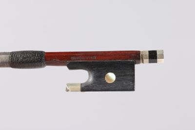 the bow is made of wood and has a metal handle