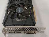 a close up of a video card sitting on top of a white table