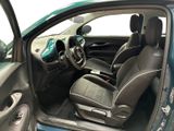 the interior of a car with the door open and the driver ' s seat up